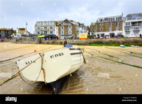 A Boat In St Ives Harbour At Low Tidecornwallenglanduk Stock Photo