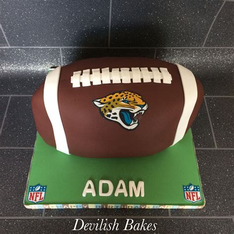 See more ideas about football birthday, football birthday cake, cake. American football cake, nfl, jaguars, hand carved and all ...