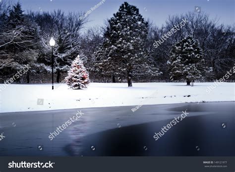 This Photo Illustration Of A Snow Covered Christmas Tree That Stands