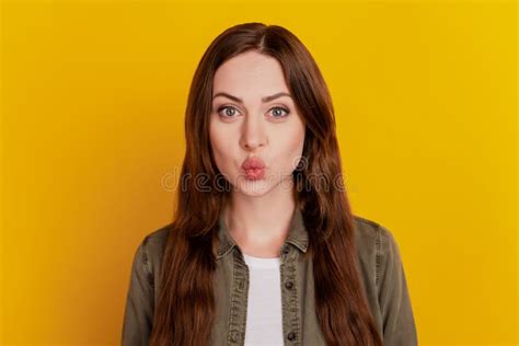 Portrait Of Dreamy Romantic Girl Send Air Kiss On Yellow Background