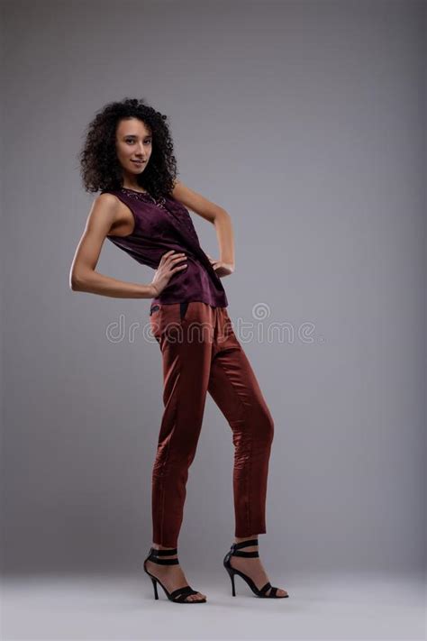 Jaunty Young Woman Posing With A Basketball Stock Image Image Of