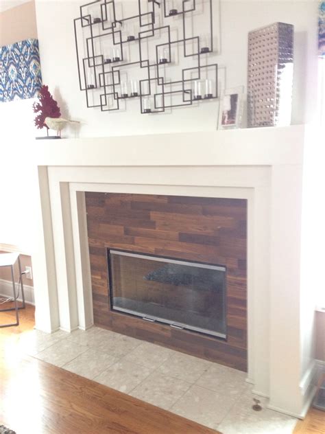 It also says the perimeter edges need to be 1/2 to 3/4 inches away from the wall. Created a reclaimed wood look around the fireplace with ...