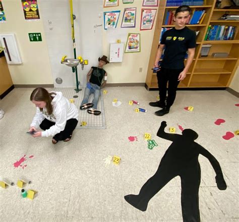 Forensic Science Class Conducts Mock Crime Scene Paw Prints