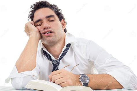 Sleepy Man With Glasses In White Shirt And Tie Sitting With Book Stock