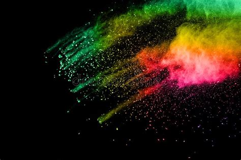 Abstract Multi Color Powder Explosion On Black Background Stock Photo