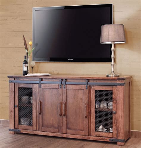 This tv stand features a stylish set of barn doors inspired by the countryside. The Best Cheap Rustic Tv Stands