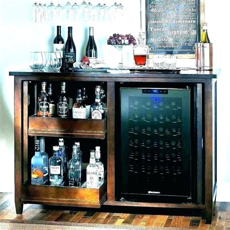 High end wine cabinets and fridges can offer some additional features that would benefit any wine connoisseur. built in liquor cabinet - Google Search | Bar cart decor ...