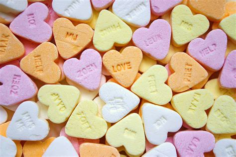 Free Photo Yellow Pink Orange And White Loves Heart Candies Candy
