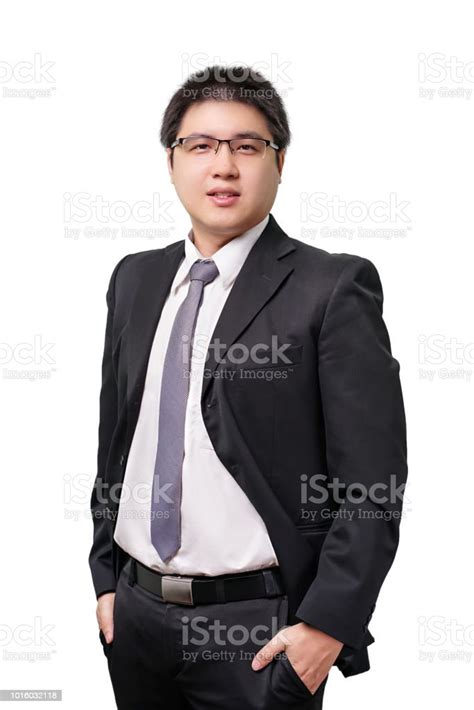 Isolated Young Asian Business Man In Formal Suit With Necktie On White