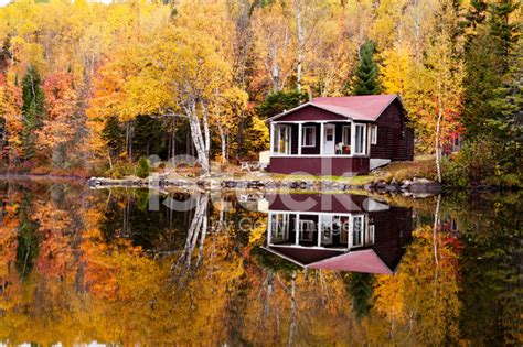 Reflections Autumn Forest House In Lake Stock Photos