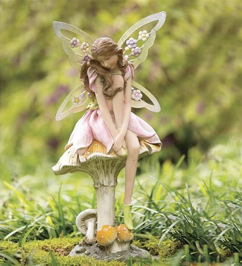 Flower Fairy On Mushroom Garden Statue In Garden Statues Garden