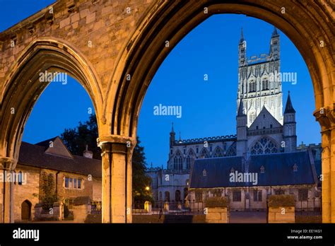 Gloucester Cathedral Viewed Through The Infirmary Arches At Night