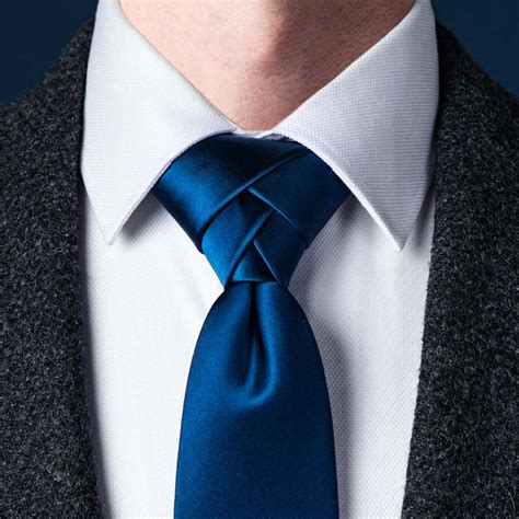 Cross the long end over the short. How To Tie A Windsor Knot | Ties.com