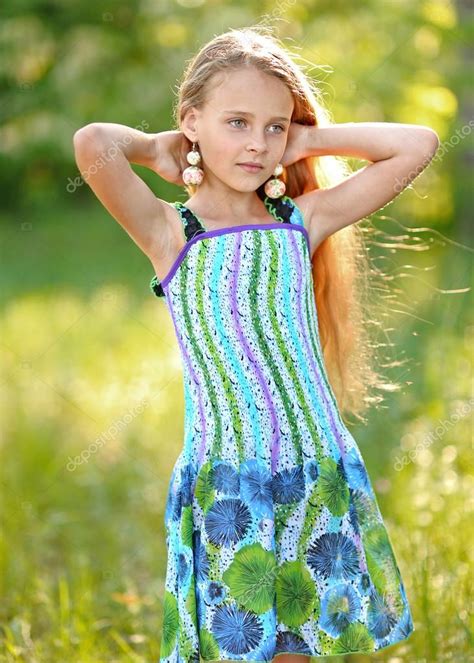 Portrait Of Little Girl Outdoors In Summer Stock Photo By ©zagorodnaya