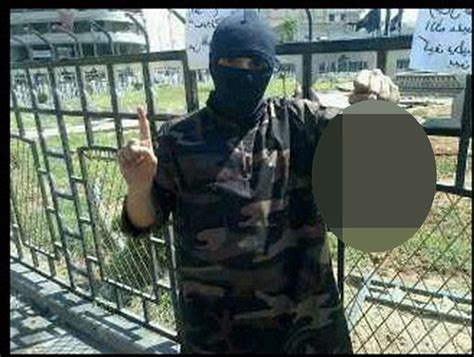 Hip Hop Isis Jihadist Poses With Severed Head In Raqqa Daily Mail Online