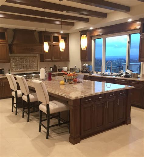 If the kitchen has an island, add its length of cabinets to your wall total. Free estimate | Kitchen Cabinets Orange County