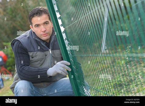Installing Fencing Hi Res Stock Photography And Images Alamy
