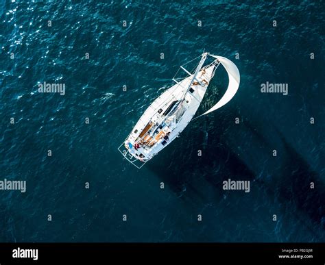 Aerial Photo Of Sailboat Yacht Top View Isolated On The Sea Texture