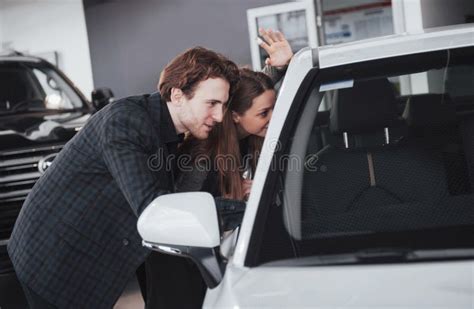 It Is The One Car I Want Beautiful Young Couple Standing At The