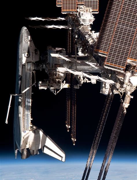 A Soace Shuttle Docking With The International Space Station Iss