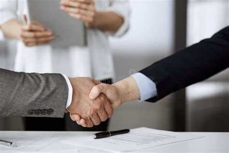 Business People Shaking Hands Finishing Contract Signing Close Up