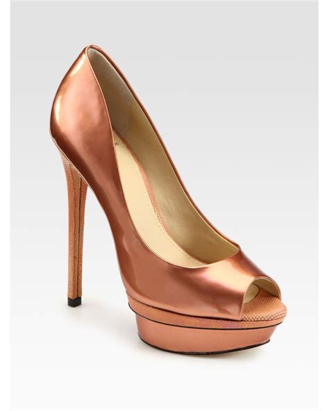 b brian atwood florencia patent leather peep toe platform pumps in metallic lyst