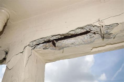 Large Cracks On Concrete Pillars And Falling Limestone Appear At