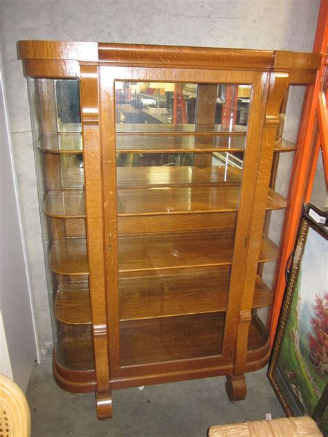 Check spelling or type a new query. ANTIQUE OAK BOWED GLASS DISPLAY CABINET