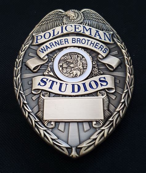 Policeman, Warner Brothers Studios (Warner Brothers Logo on buck) | Fire badge, Warner brothers 