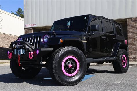 16 Lifted Jeep With Rockstars And Pink Accents Trinity Motorsports