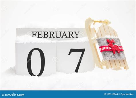 Wooden Calendar For February 7 Th Day Of The Winter Month The Symbols