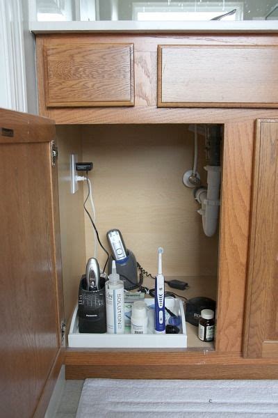 He showed us how he adds an outlet to a kitchen backsplash by running conduit through the back of the cabinets. I cant find any other pics of this, but it is a MUST have ...
