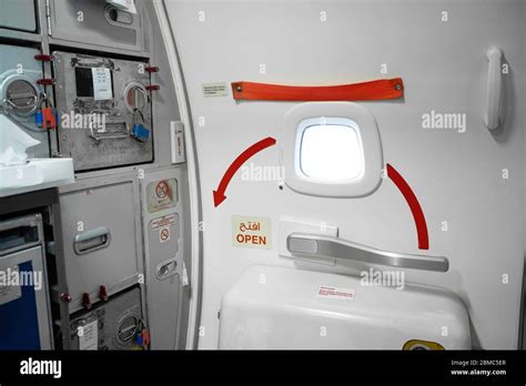 Emergency Exit Door In An Airplane Stock Photo Alamy
