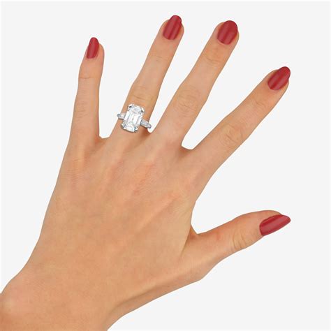 Art Deco Style Diamond Step Cut Engagement Ring Set In Platinum At Susannah Lovis Jewellers