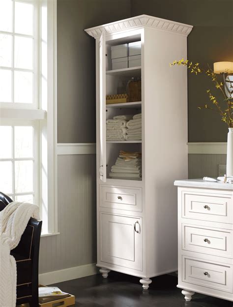 This bathroom storage cabinet boasts the understated molding, recessed panels, angled apron and tapered feet that characterize the manor grove collection. Unique Bathroom Storage Cabinets | Linen storage cabinet ...