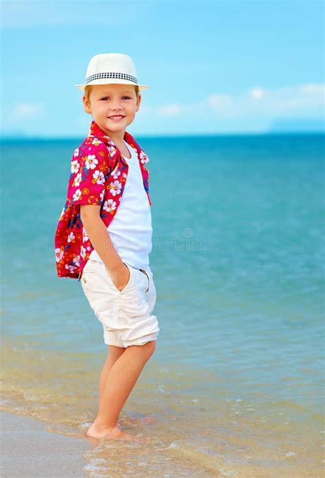 Cute Fashionable Boy Stands In Surf On Summer Beach Stock Image Image