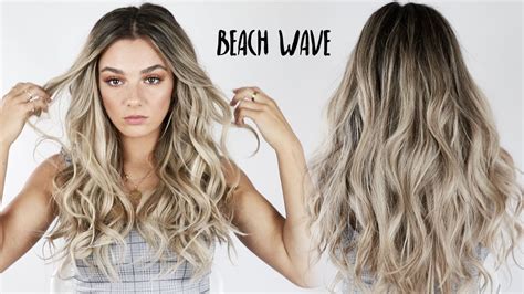Divide your hair into two sections and braid it. Aveda How-To | Curling Iron Beachy Waves Tutorial with ...