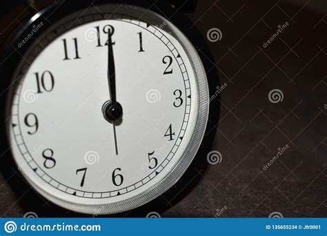 Clock Pointing To Different Times Stock Photo Image Of Table Black