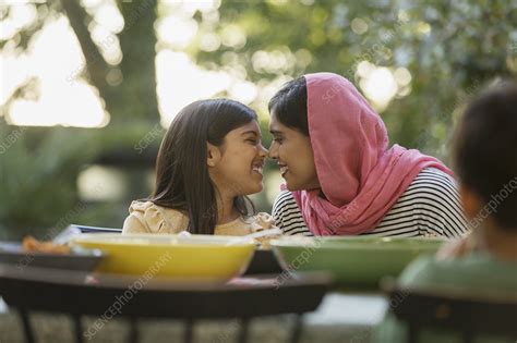 Affectionate Mother In Hijab Rubbing Noses Stock Image F Science Photo Library