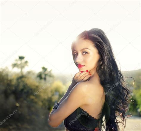Beautiful Exotic Woman With Gorgeous Long Hair Stock Photo By ©avfc