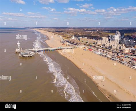 Pier With Ferris Wheel At Northern Sea Scheveningen Beach Located