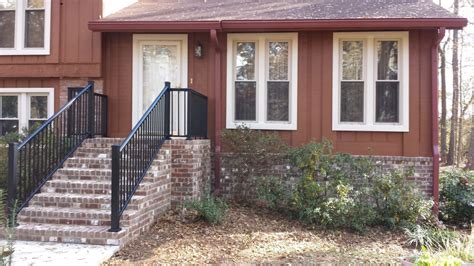 Here we share indoor stair railing design ideas for inspiration. Black Aluminum Front Porch Railing Red Brick House ...