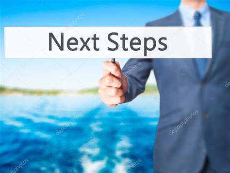 Next Steps Business Man Showing Sign — Stock Photo © Jdudzinski