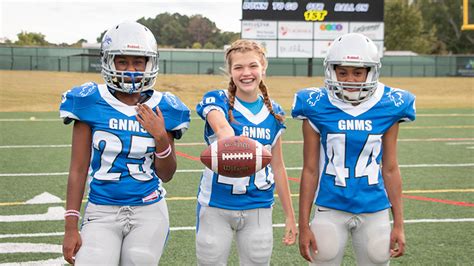 Three Girls Discuss Playing Football In A Male Dominated Sport