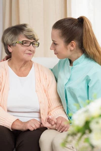 Nursing Lady At Home — Stock Photo © Alexraths 6867603