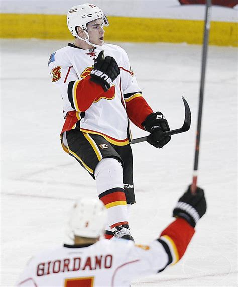 Monahan scores OT winner to lift Flames over Oilers in battle of cellar