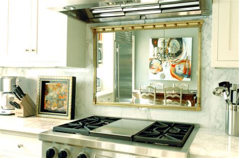 It's such a great way to weave a dynamic visual element into your kitchen design. So Sterling and Company: Mirror Kitchen Backsplash