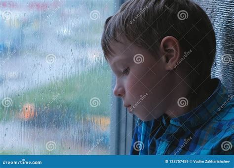 Sad Crying Boy In Rain
