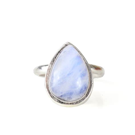 Beautiful rare antique victorian 14k diamond carved moonstone man in moon ring! large statement sterling silver teardrop moonstone ring by amelia may | notonthehighstreet.com