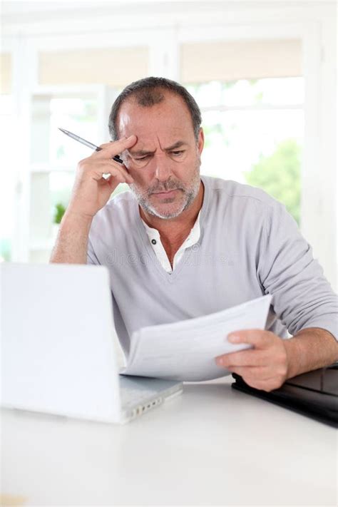 Senior Man Figuring Out The Tax Declaration Stock Photo Image Of